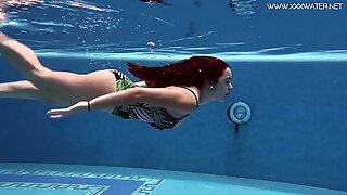 Diana Rius with hot tits touches her body underwater